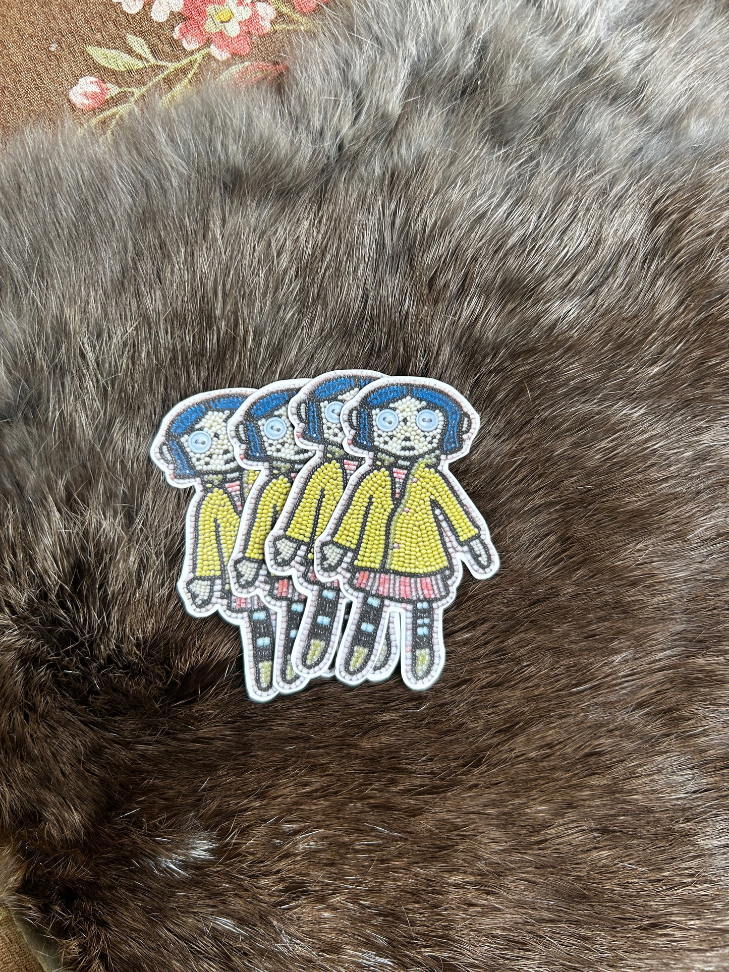 normal sized coraline sticker