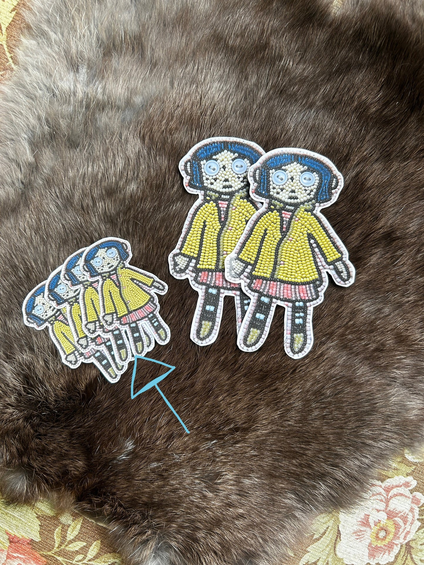 normal sized coraline sticker